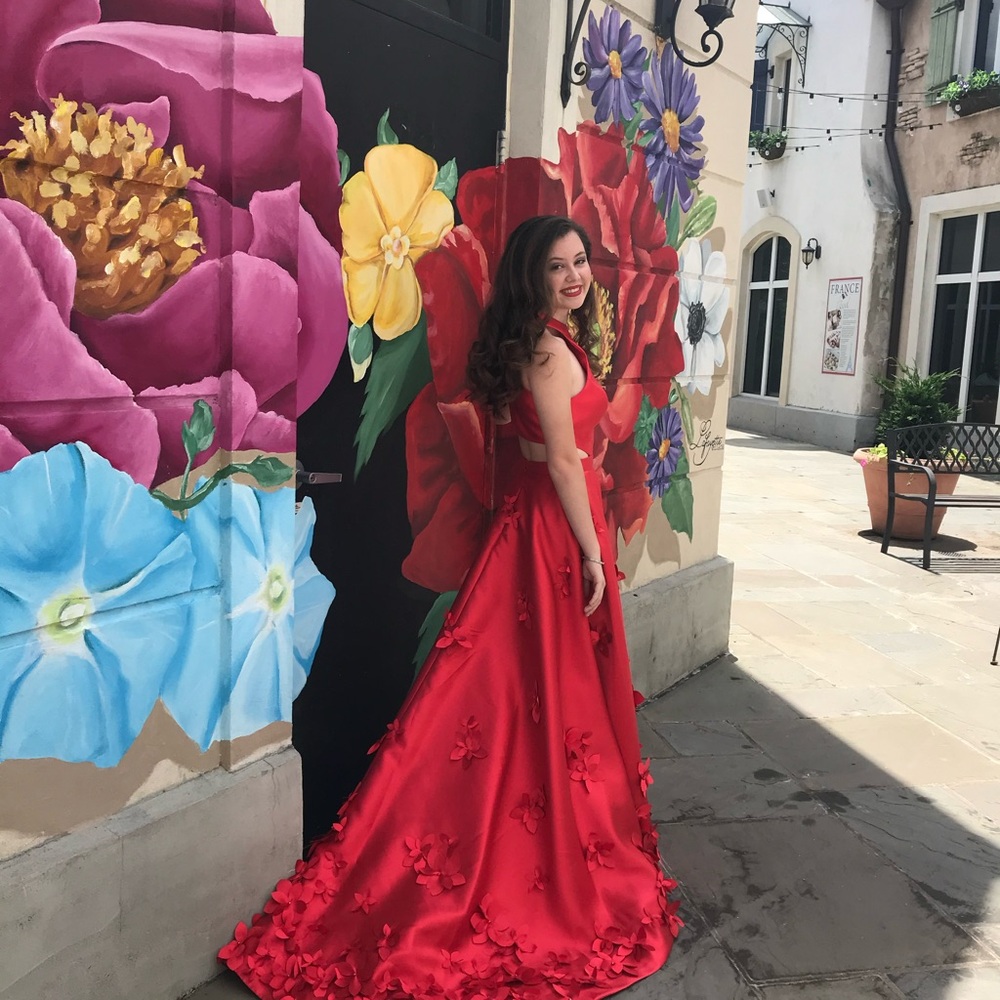 Elegant Red Gown with Floral Details